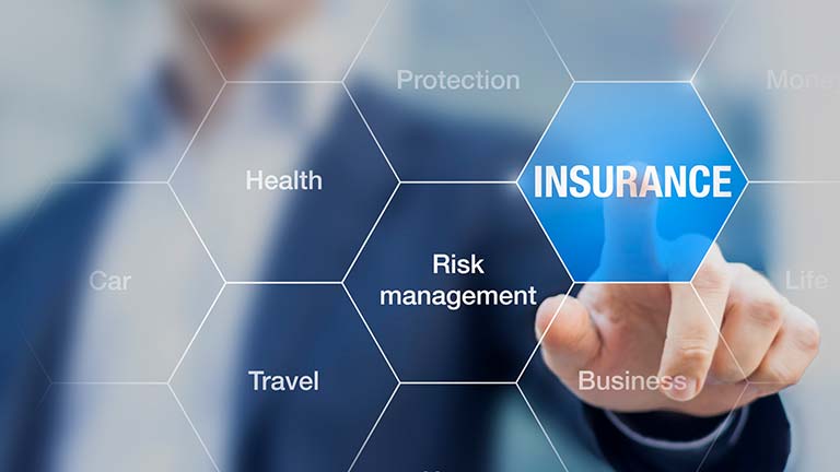 man pointing to the word insurance