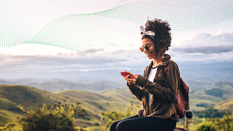 woman using mobile device in remote location