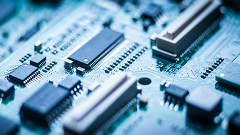 A close-up of a PCB showing integrated circuits