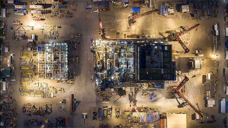 a-construction-site-seen-from-above-at-night